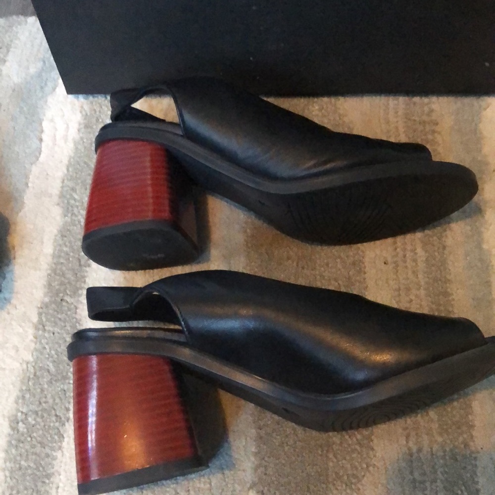 Gorgeous sling back open toe with red accent heels